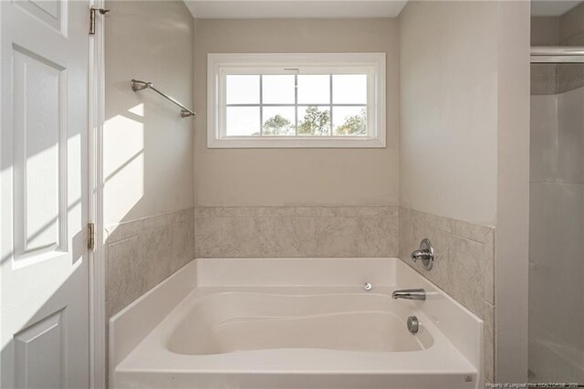 2109 Stonewash Dr, Fayetteville, NC 28306 - bathroom featuring a bath