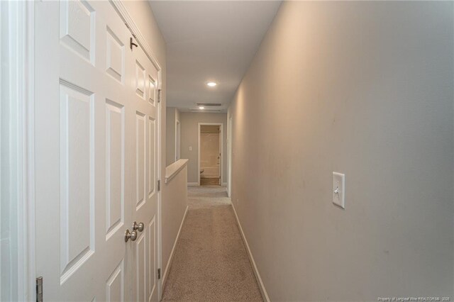 2109 Stonewash Dr, Fayetteville, NC 28306 - hallway featuring baseboards, recessed lighting, and light colored carpet