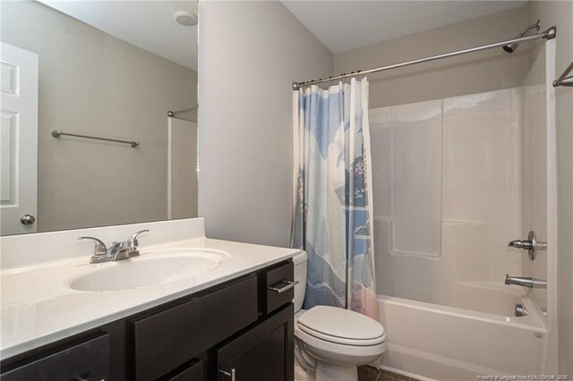 2109 Stonewash Dr, Fayetteville, NC 28306 - full bath with shower / bath combo with shower curtain, toilet, and vanity