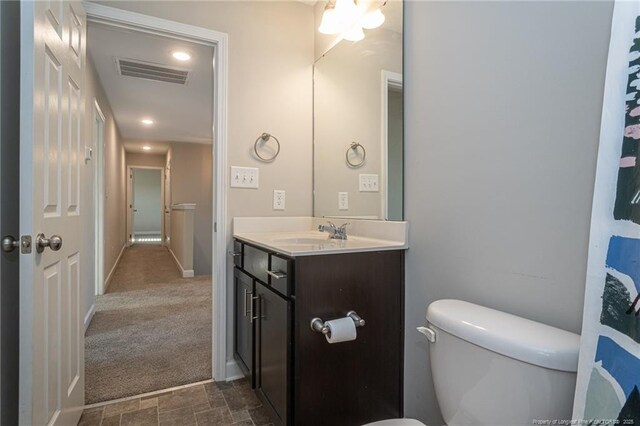2109 Stonewash Dr, Fayetteville, NC 28306 - bathroom with visible vents, recessed lighting, toilet, and vanity