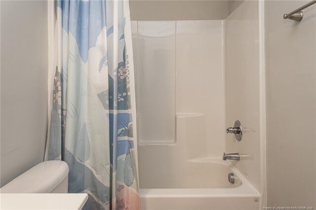 2109 Stonewash Dr, Fayetteville, NC 28306 - full bath featuring shower / bath combo with shower curtain, toilet, and vanity