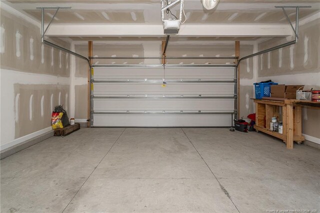 2109 Stonewash Dr, Fayetteville, NC 28306 - garage featuring a garage door opener