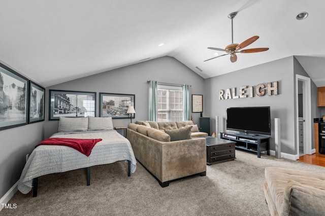 living area featuring light colored carpet, ceiling fan, vaulted ceiling, and baseboards