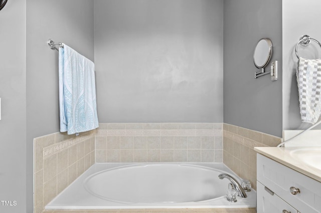full bathroom with a bath and vanity