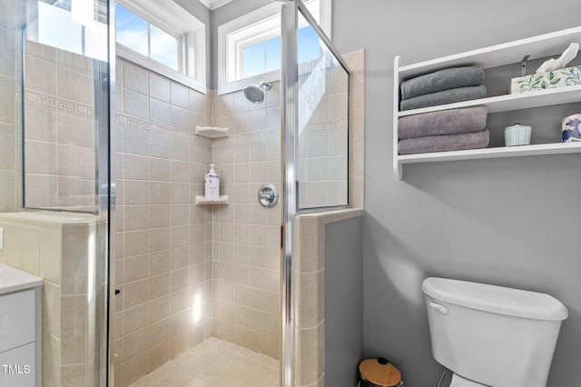 full bath with toilet and a shower stall
