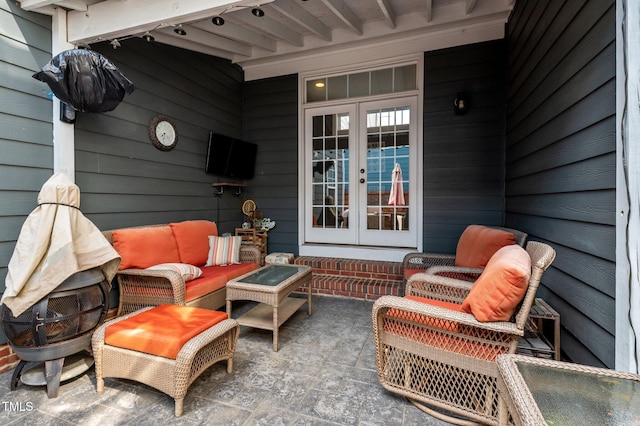 view of patio / terrace featuring an outdoor living space and french doors