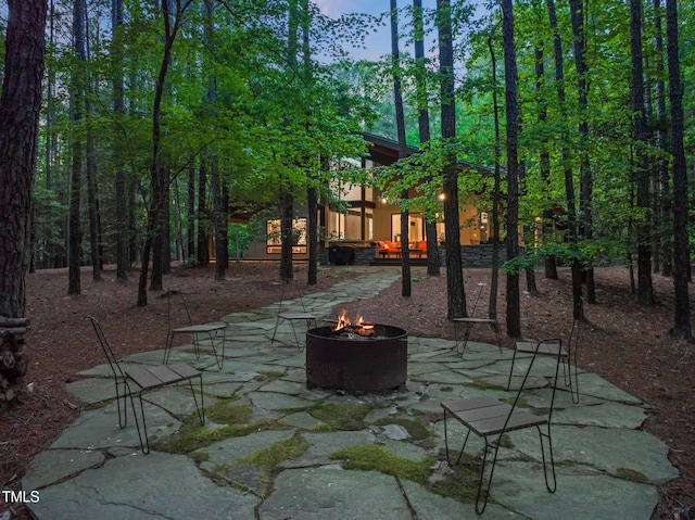 view of patio / terrace with a fire pit