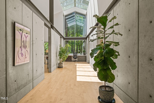foyer featuring wood finished floors