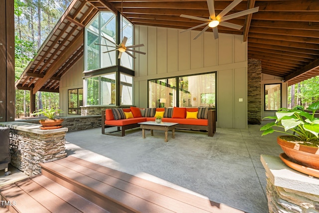 view of patio with ceiling fan and outdoor lounge area