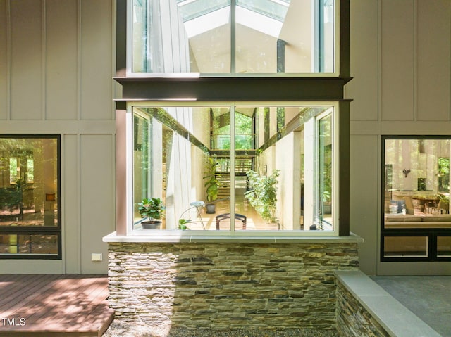 bar featuring plenty of natural light and a skylight