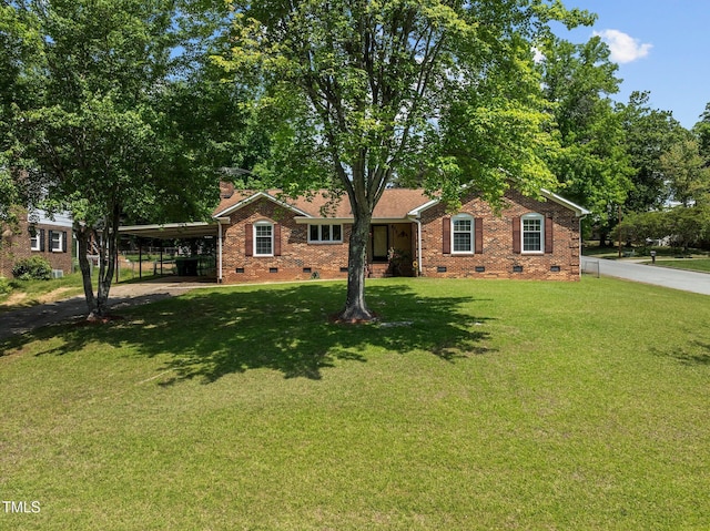 ranch-style home featuring brick siding, a front yard, and crawl space
