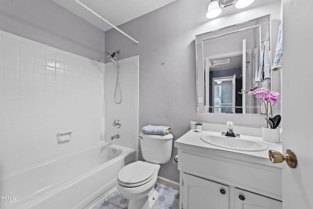 full bath with vanity, baseboards, toilet, and shower / tub combination