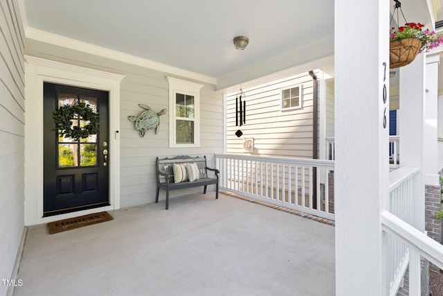 property entrance featuring a porch