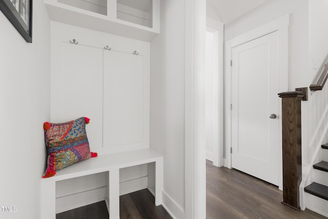 mudroom with dark wood finished floors