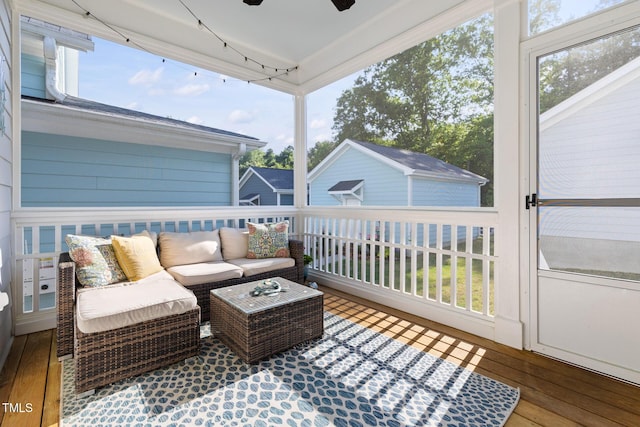 exterior space with a ceiling fan and outdoor lounge area