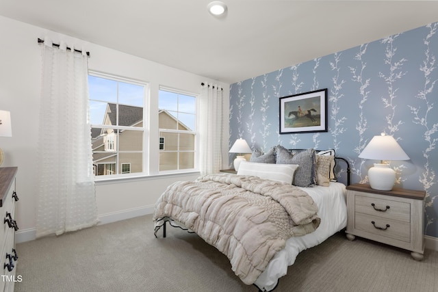 264 Alden Way, Angier, NC 27501 - bedroom with baseboards, wallpapered walls, and light colored carpet