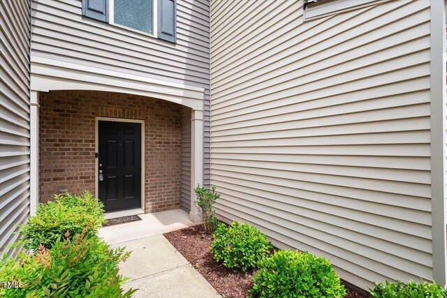 107 Tuftin Dr, Durham, NC 27703 - view of exterior entry with brick siding