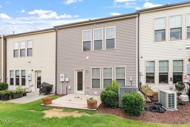107 Tuftin Dr, Durham, NC 27703 - rear view of house featuring a patio area and a yard