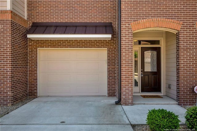 278 Hugh Shelton Loop, Fayetteville, NC 28301 - entrance to property with a standing seam roof, brick siding, driveway, and metal roof
