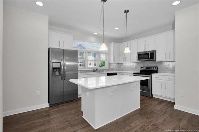 278 Hugh Shelton Loop, Fayetteville, NC 28301 - kitchen with a center island, light countertops, white cabinetry, a sink, and stainless steel appliances