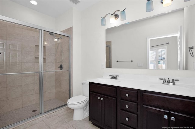278 Hugh Shelton Loop, Fayetteville, NC 28301 - bathroom featuring tile patterned flooring, a sink, toilet, and a shower stall