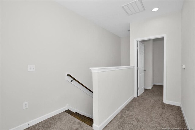 278 Hugh Shelton Loop, Fayetteville, NC 28301 - corridor with visible vents, baseboards, recessed lighting, carpet, and an upstairs landing