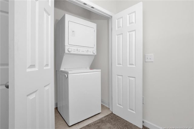 278 Hugh Shelton Loop, Fayetteville, NC 28301 - clothes washing area with laundry area, baseboards, and stacked washer and clothes dryer