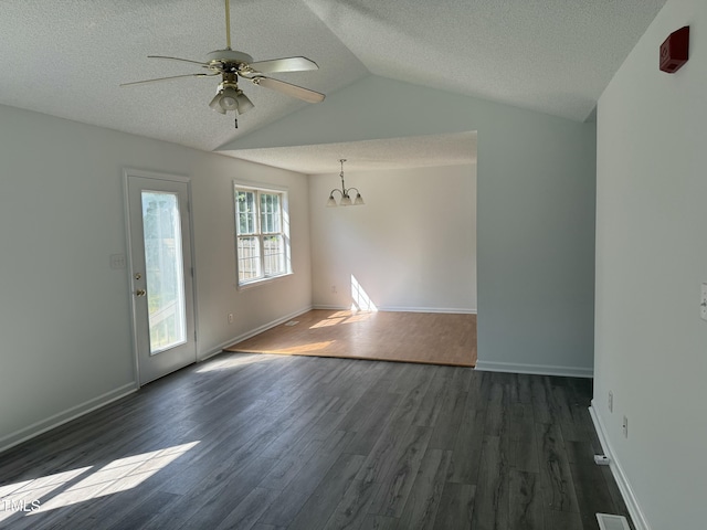 118 Hawthorn Dr, Clayton, NC 27520 - interior space featuring a textured ceiling, ceiling fan with notable chandelier, and dark wood-style floors