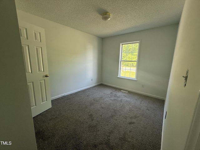 118 Hawthorn Dr, Clayton, NC 27520 - unfurnished room featuring a textured ceiling, carpet, and baseboards