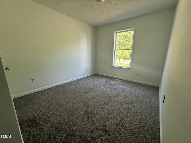 118 Hawthorn Dr, Clayton, NC 27520 - carpeted empty room with a textured ceiling, visible vents, and baseboards