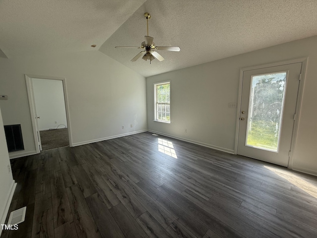 118 Hawthorn Dr, Clayton, NC 27520 - interior space with a ceiling fan, dark wood-style flooring, a textured ceiling, and vaulted ceiling