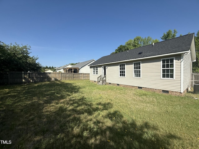 118 Hawthorn Dr, Clayton, NC 27520 - back of house with a yard, entry steps, fence, and crawl space