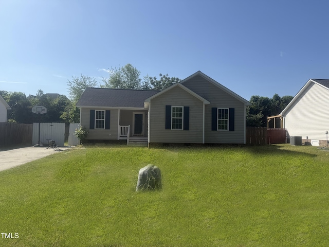 118 Hawthorn Dr, Clayton, NC 27520 - ranch-style house featuring central air condition unit, a front yard, and fence