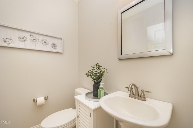 8840 Woodyhill Rd, Raleigh, NC 27613 - bathroom featuring a sink and toilet
