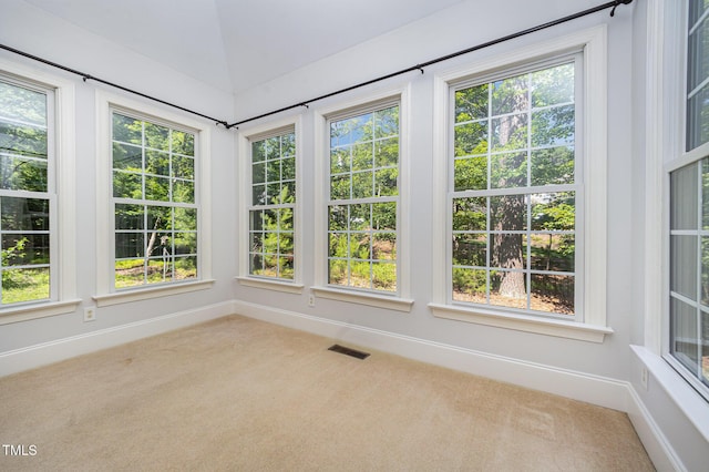 8840 Woodyhill Rd, Raleigh, NC 27613 - unfurnished sunroom with carpet and baseboards