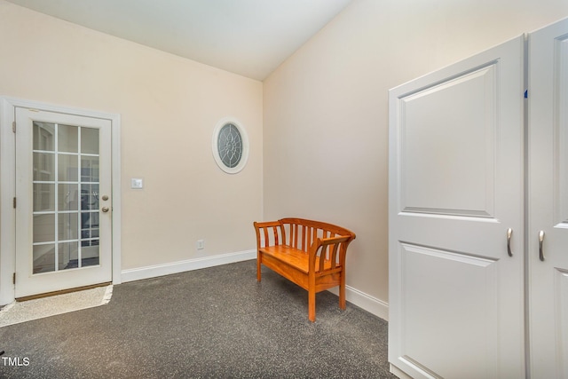 8840 Woodyhill Rd, Raleigh, NC 27613 - living area with baseboards and lofted ceiling
