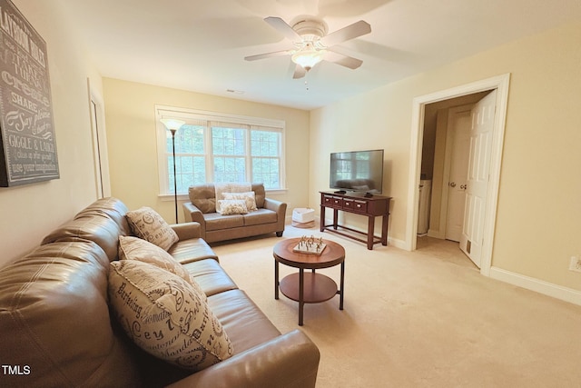 8840 Woodyhill Rd, Raleigh, NC 27613 - living area with ceiling fan and light carpet