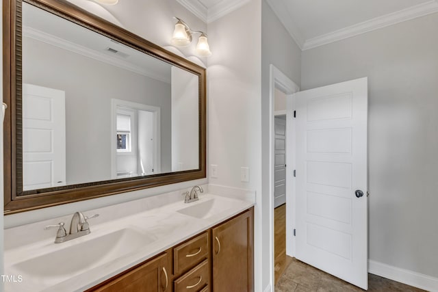 full bath featuring a sink, ornamental molding, double vanity, and visible vents