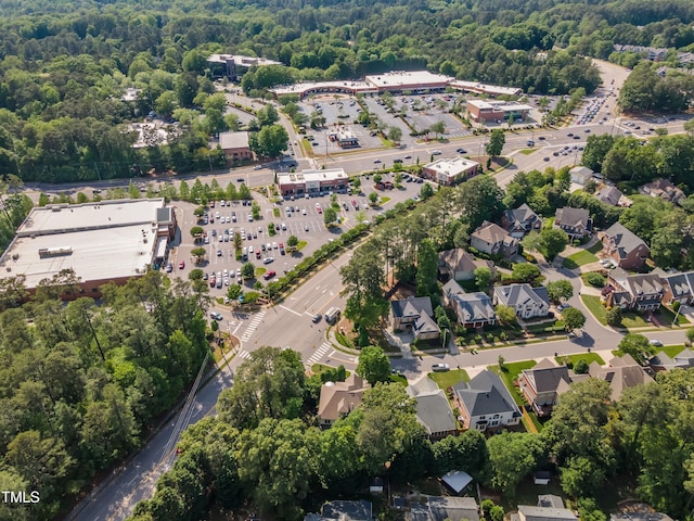 aerial view with a wooded view
