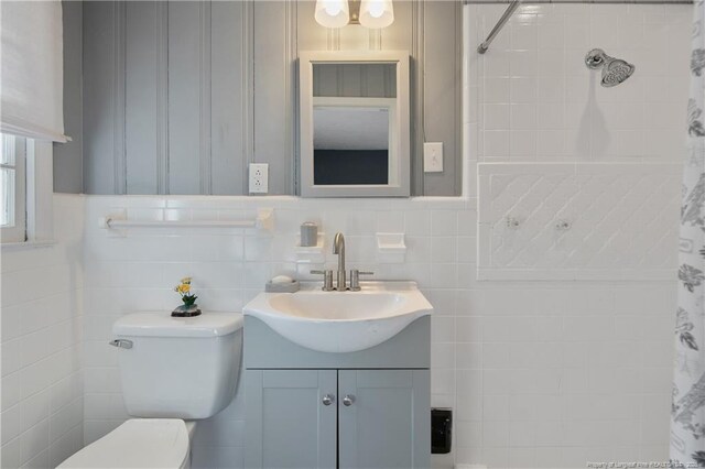 6019 S US Highway 301, Hope Mills, NC 28348 - bathroom featuring toilet, tile walls, a shower with shower curtain, and vanity