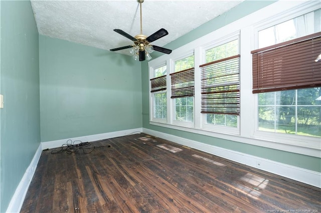 236 E Andrews Ave, Henderson, NC 27536 - spare room with wood-type flooring, a textured ceiling, baseboards, and ceiling fan