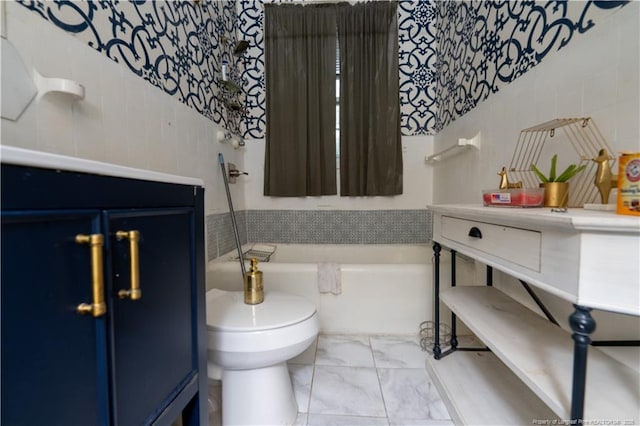 236 E Andrews Ave, Henderson, NC 27536 - full bathroom with marble finish floor, toilet, a tub to relax in, and vanity