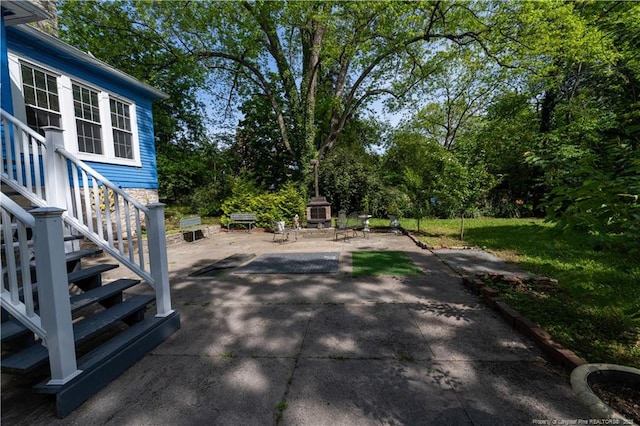 236 E Andrews Ave, Henderson, NC 27536 - view of yard featuring a patio area