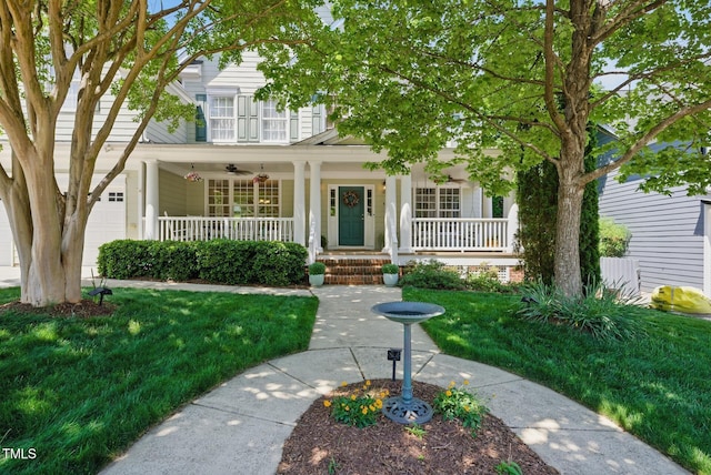 view of front of property with covered porch and a front lawn