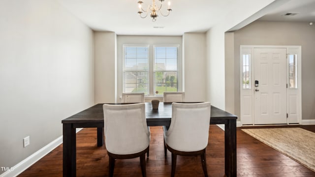 912 Beech Glen Dr, Mebane, NC 27302 - dining area featuring baseboards, a notable chandelier, visible vents, and dark wood-type flooring