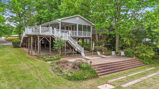 104 Pontiac Cv, Louisburg, NC 27549 - rear view of house featuring stairs, a yard, a deck, and a patio