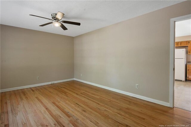 1001 Arberdale, Fayetteville, NC 28304 - unfurnished room featuring baseboards, light wood finished floors, and ceiling fan