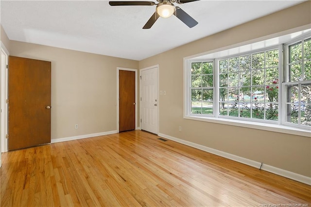 1001 Arberdale, Fayetteville, NC 28304 - empty room with a ceiling fan, baseboards, visible vents, and light wood finished floors