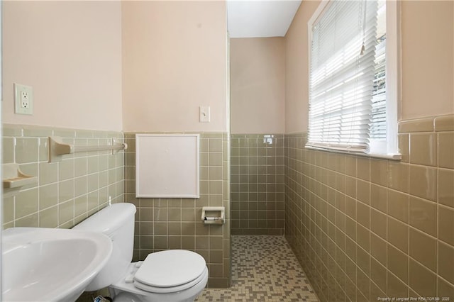 1001 Arberdale, Fayetteville, NC 28304 - bathroom with a sink, tile walls, and wainscoting