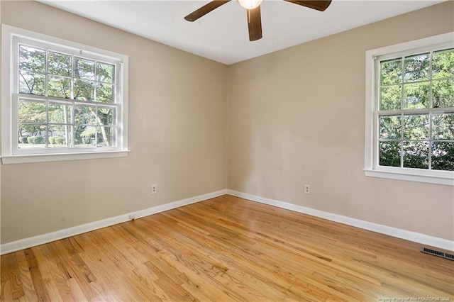 1001 Arberdale, Fayetteville, NC 28304 - spare room with baseboards, ceiling fan, light wood finished floors, and visible vents